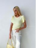 Rebrovaný top s tulipánovými rukávmi žltý AB 200