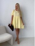 Mušelínové šaty s mašlemi na zádech žluté AB 174