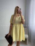 Mušelínové šaty s mašlemi na zádech žluté AB 174