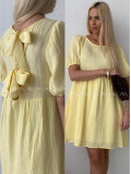 Mušelínové šaty s mašlemi na zádech žluté AB 174